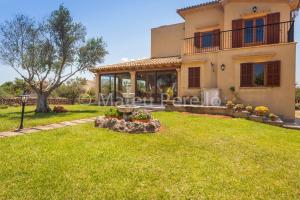 an image of a house with a yard at Villa Santa Eulalia in Can Picafort