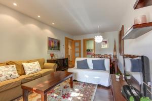 A seating area at Apartamentos Suites&Homes