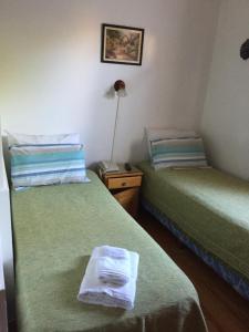 Una cama o camas en una habitación de Hotel Loma Alegre