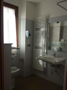 Ванная комната в Casa Alpina Sacro Cuore