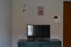 TV a/nebo společenská místnost v ubytování A Pochi Passi