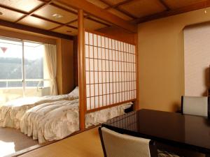 Cama o camas de una habitación en Shimoda Kaihin Hotel