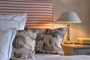 Postel nebo postele na pokoji v ubytování Brauereigasthof-Hotel Aying