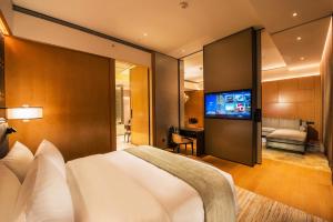 Voodi või voodid majutusasutuse MGM Cotai toas
