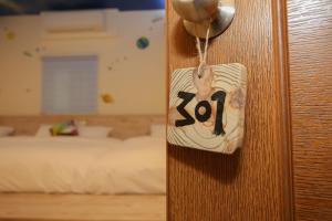 Ліжко або ліжка в номері Fa Dai Homestay