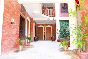 A fachada ou entrada de Newa Home