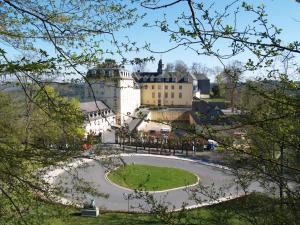 a view of a castle from the trees at Schloß Wittgenstein in Bad Laasphe