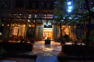a courtyard of a building at night at T&T Story Hotel (Xi Gong Pier) in Kunming