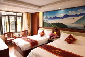 Giường trong phòng chung tại Son Ha Sapa Hotel Plus