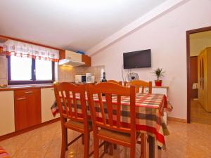 Kuchyň nebo kuchyňský kout v ubytování Apartments Blazenka 1270
