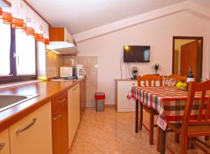Kuchyň nebo kuchyňský kout v ubytování Apartments Blazenka 1270