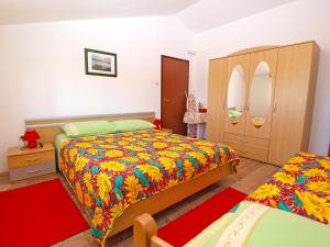 Postel nebo postele na pokoji v ubytování Apartments Blazenka 1270
