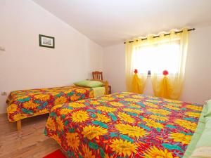 Postel nebo postele na pokoji v ubytování Apartments Blazenka 1270