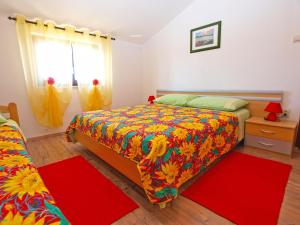Postel nebo postele na pokoji v ubytování Apartments Blazenka 1270