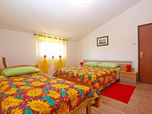 Postel nebo postele na pokoji v ubytování Apartments Blazenka 1270