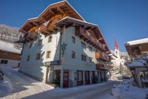 a hotel in a ski resort in the snow at Hotel Garberwirt in Hippach