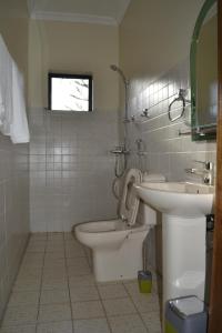Ett badrum på Zakinn Hotel Gangilonga