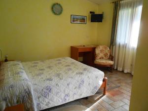Postel nebo postele na pokoji v ubytování Agriturismo Taglio del Re + 37 fotografií
