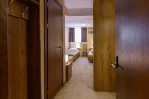 Voodi või voodid majutusasutuse Hotel Reverence toas