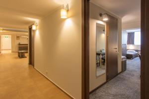 Voodi või voodid majutusasutuse Hotel Reverence toas