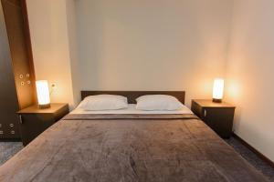 Voodi või voodid majutusasutuse Hotel Reverence toas