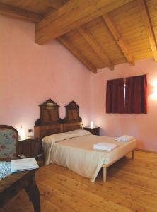 Postel nebo postele na pokoji v ubytování Lokanda Devetak + 48 fotografií