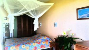Postel nebo postele na pokoji v ubytování Studios Carribean Sea View
