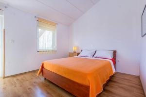 Posteľ alebo postele v izbe v ubytovaní Apartment Lenka