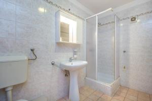 Kúpeľňa v ubytovaní Apartment Lenka + 13 fotografií