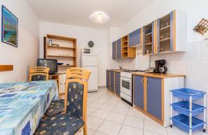 Kuchyň nebo kuchyňský kout v ubytování Apartments Winny