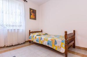 Postel nebo postele na pokoji v ubytování Apartments Winny