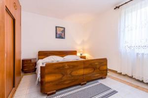Postel nebo postele na pokoji v ubytování Apartments Winny