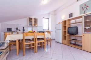 Kuchyň nebo kuchyňský kout v ubytování Apartments Winny