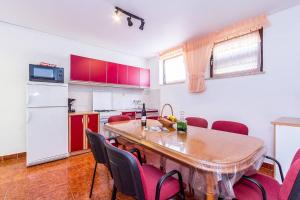 Kuchyň nebo kuchyňský kout v ubytování Apartments Winny
