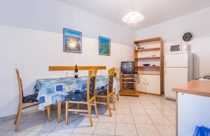Kuchyň nebo kuchyňský kout v ubytování Apartments Winny