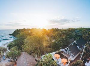 an aerial view of a resort with the ocean at Villa Waru One in Nusa Lembongan