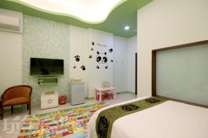 Krevet ili kreveti u jedinici u okviru objekta Zhen Ai B&B