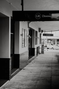 an empty hallway of a building with a parking garage at General Roberts Hotel in New Lambton