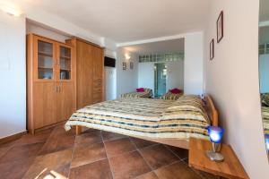 Posteľ alebo postele v izbe v ubytovaní Villa Carmen Rooms & Apartments