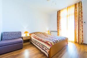 Posteľ alebo postele v izbe v ubytovaní Villa Carmen Rooms & Apartments
