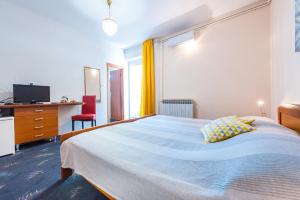 Posteľ alebo postele v izbe v ubytovaní Villa Carmen Rooms & Apartments