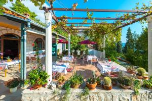 Vonkajšia záhrada v ubytovaní Villa Carmen Rooms & Apartments