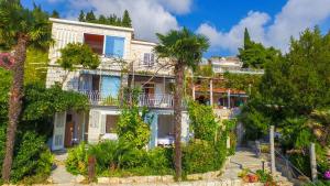 Vonkajšia záhrada v ubytovaní Villa Carmen Rooms & Apartments