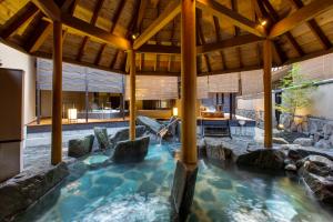 Bazén v ubytování Hirugami Grand Hotel Tenshin nebo v jeho okolí