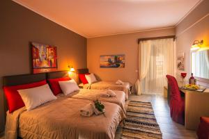 Postel nebo postele na pokoji v ubytování Kyparissia Beach Hotel + 37 fotografií