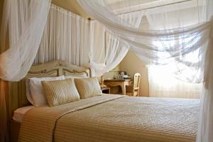 Aegean Village Beachfront Resort客房内的一张或多张床位