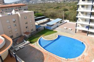 a swimming pool on the roof of a building at Atico Peniscola in Peniscola