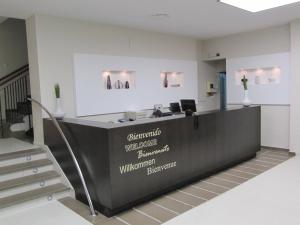 an office with a reception desk in a building at Don Juan in Granada