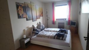 Postel nebo postele na pokoji v ubytování Appartement STOA