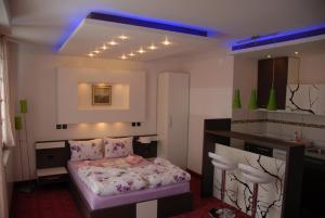 Łóżko lub łóżka w pokoju w obiekcie Villa Milmari